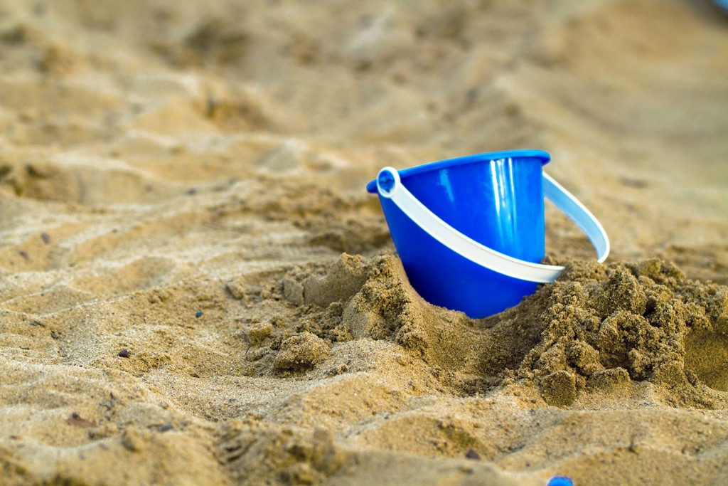 #196384267 Bucket in Sand