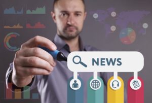 Search Engine News, person in the background with a blue marker