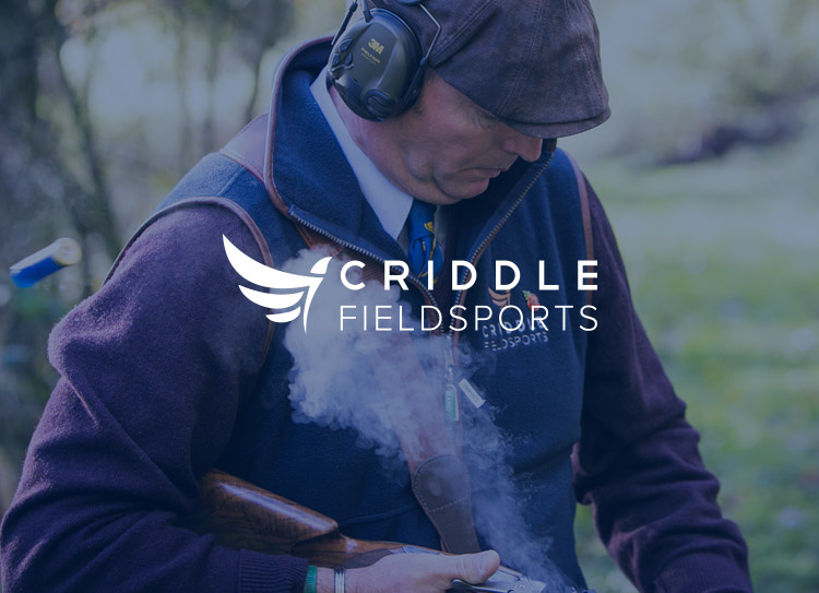 Criddle Fieldsports Logo with person loading shotgun in background