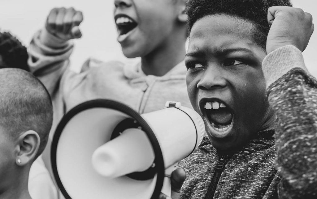 Young People Shouting Megaphone