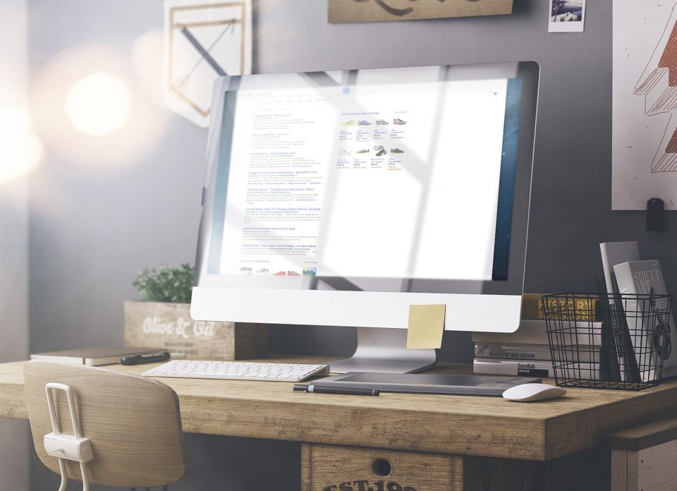 Verve News Articles Desktop iMac on a set up desk for working