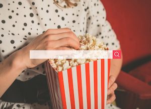 Verve News Articles Person eating popcorn