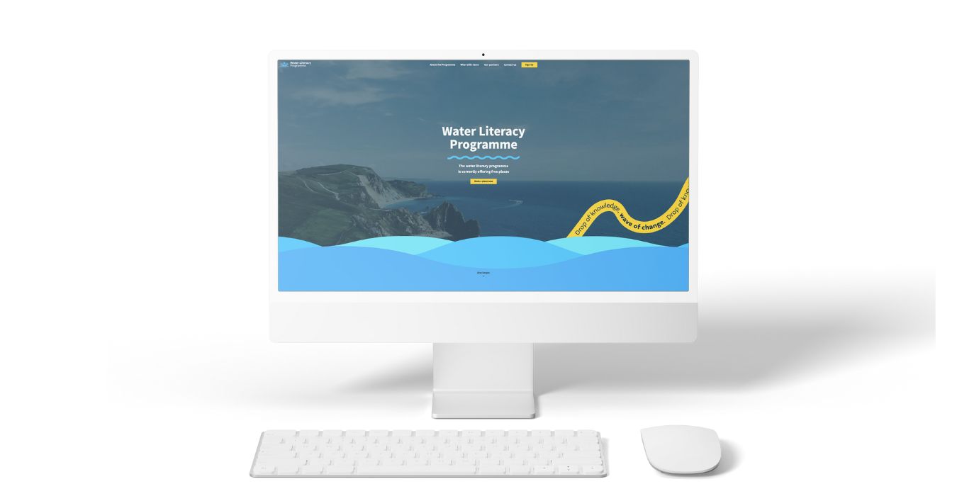 Device mockup showing water literacy website on a desktop